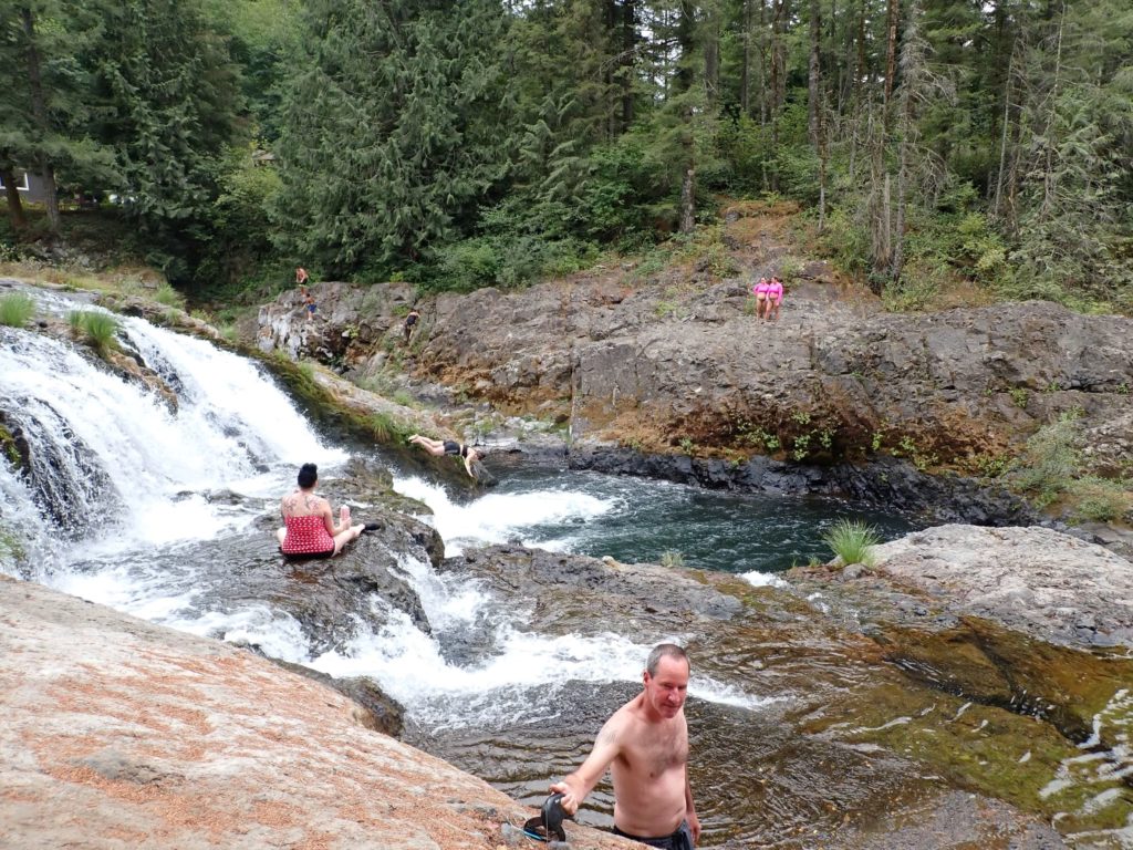 People enjoying themselves at the top of Dougan Falls